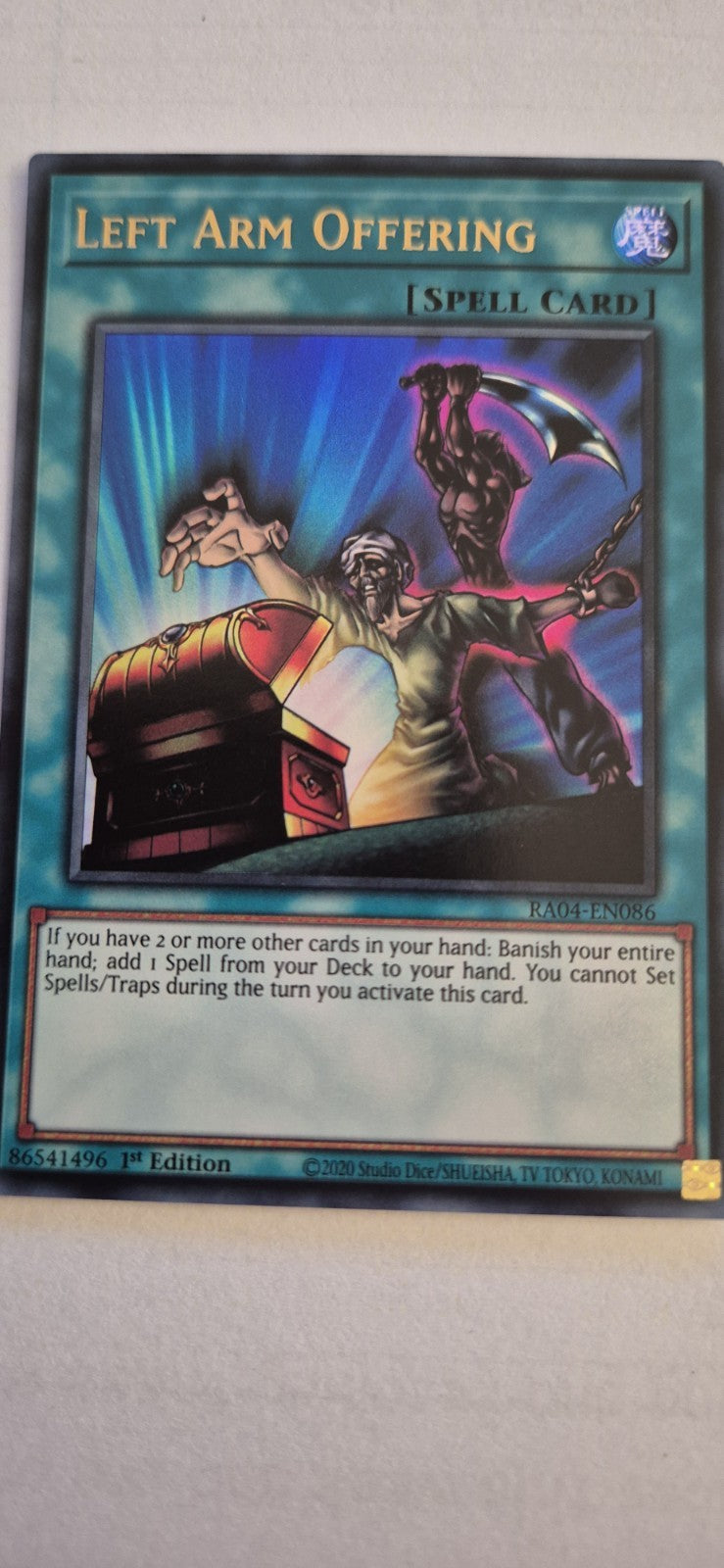 Left Arm Offering - RA04-EN086 - 1st Edition Ultra Rare Near Mint