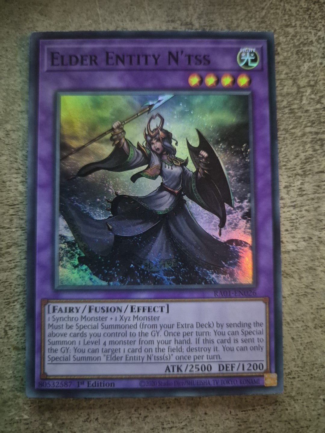 Elder Entity N'tss - RA01-EN026 - Super Rare Near Mint
