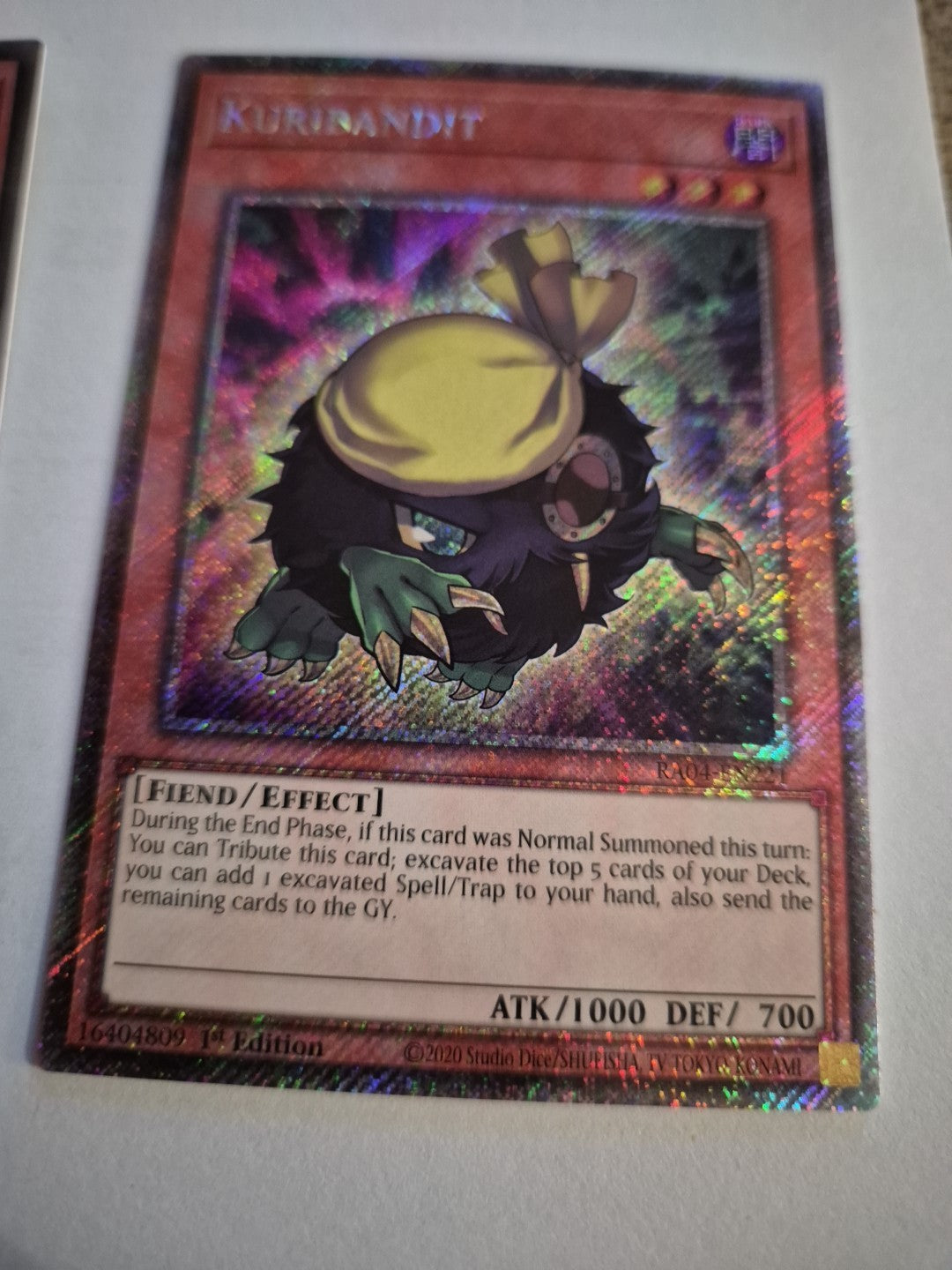 Yugioh 1x Kuribandit RA04-EN221 Platinum Secret Rare 1st Ed NM