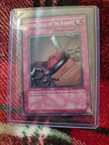 Seven Tools of The Bandit - DB2-EN075 – SUPER RARE Yugioh